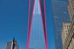 Budova vzniknuvší po řízeném odpalu dvojčat. Symbol W.